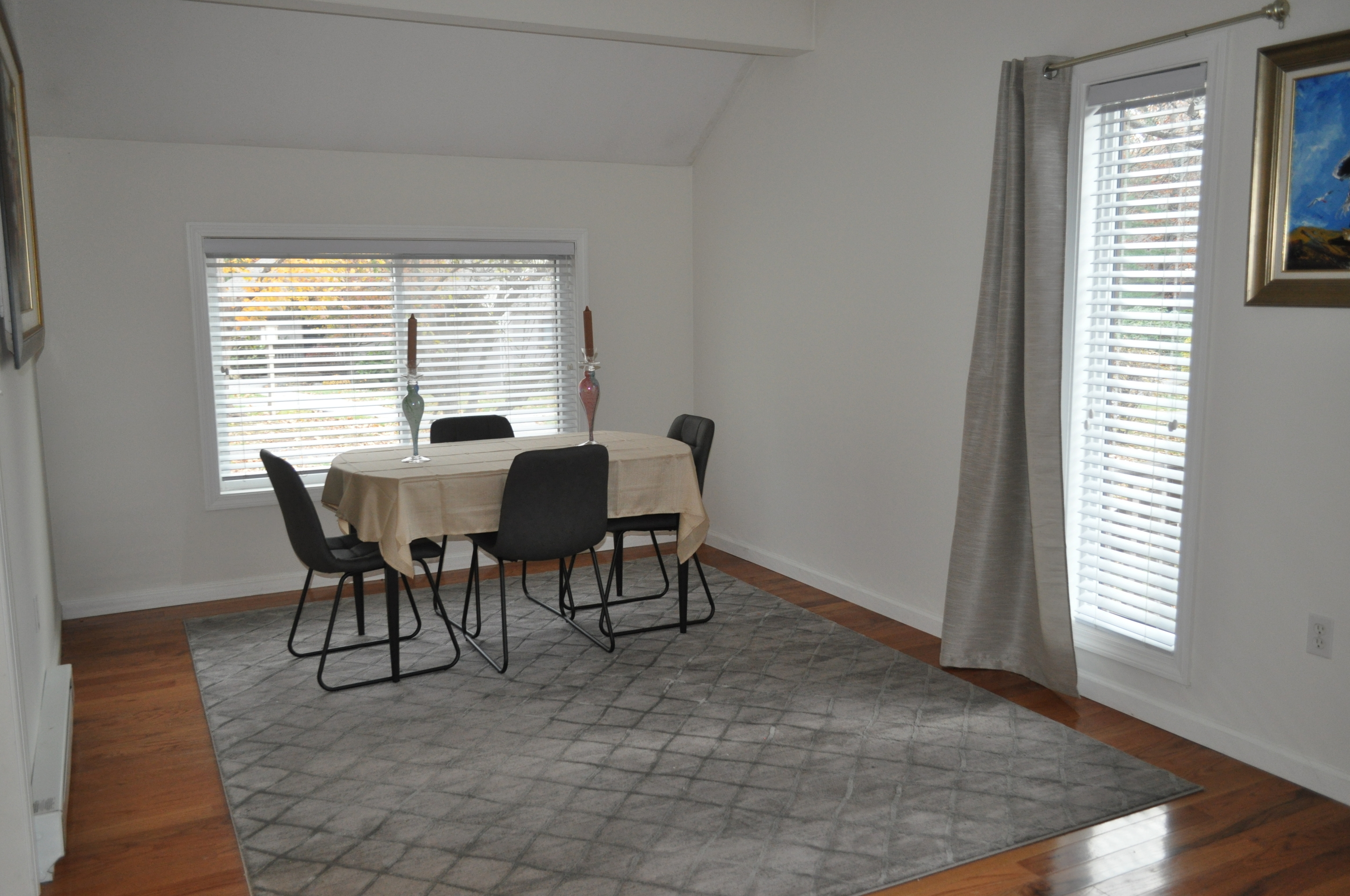 29 Crocus Lane, Unit 29 Avon, CT 06001 - Photo 3 of 13 a view of a dining room with furniture and wooden floor