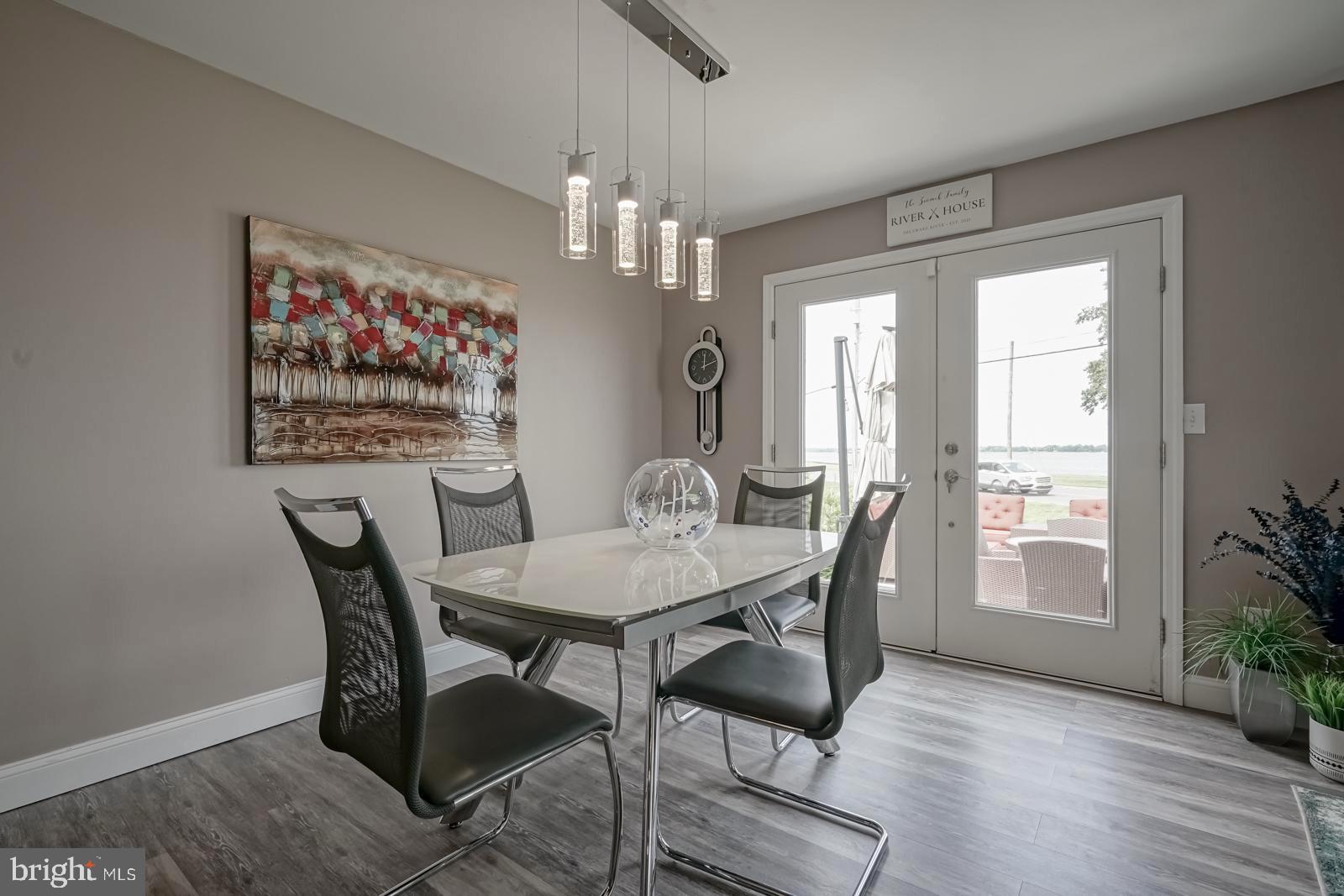 141 Michigan Road Pennsville, NJ 08070 - Photo 12 of 74 Dining rm--patio doors with a water view!
