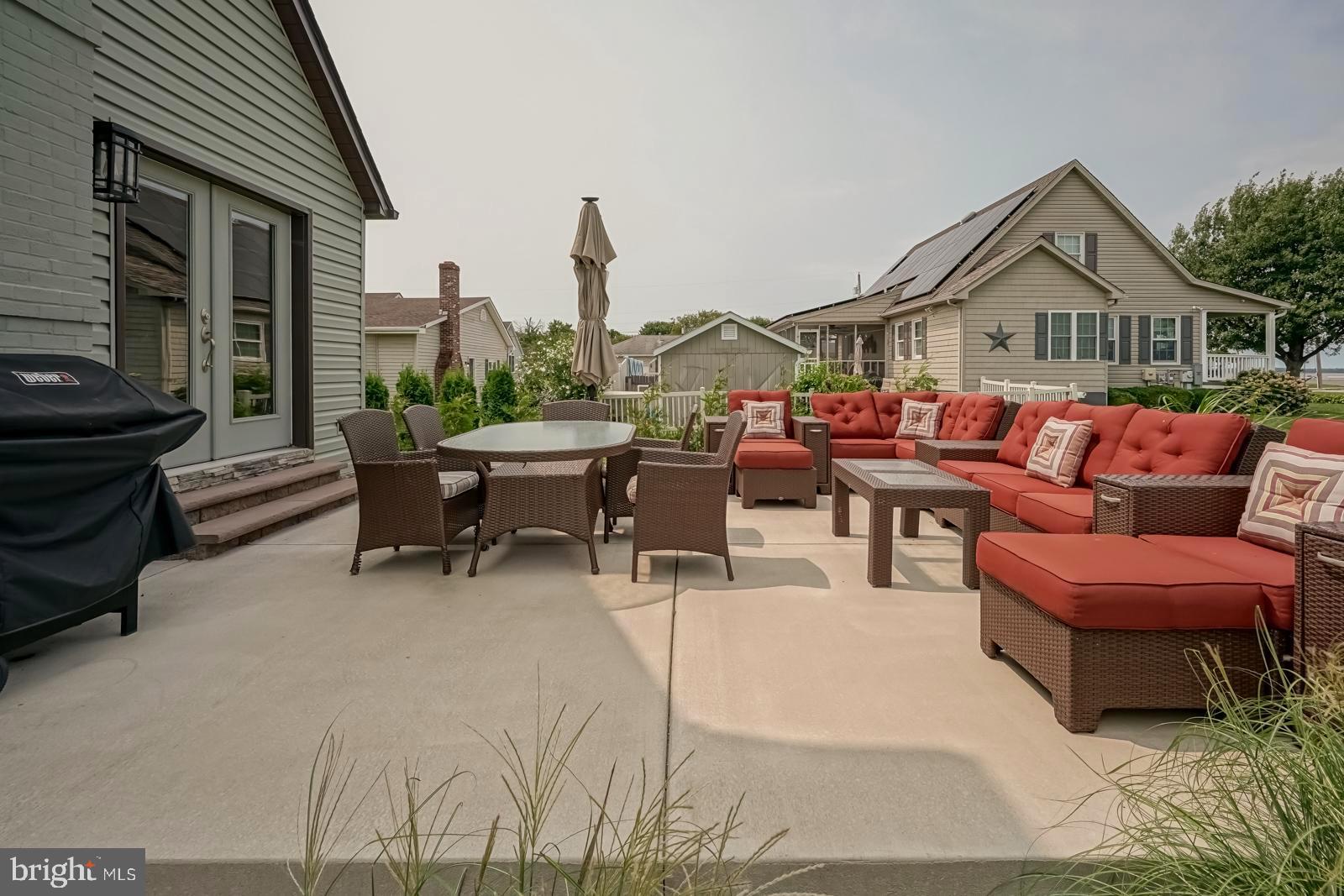 141 Michigan Road Pennsville, NJ 08070 - Photo 17 of 74 Side raised concrete patio faces the water