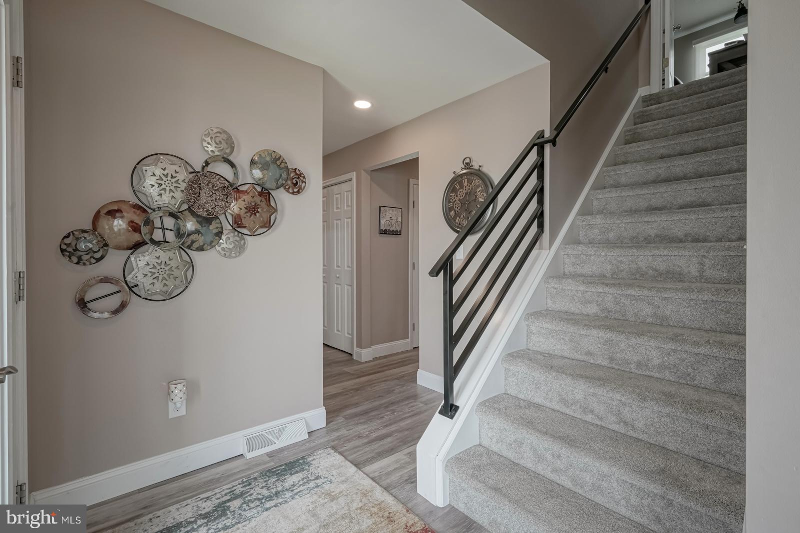 141 Michigan Road Pennsville, NJ 08070 - Photo 33 of 74 Wrought iron railing leads to 2nd level
