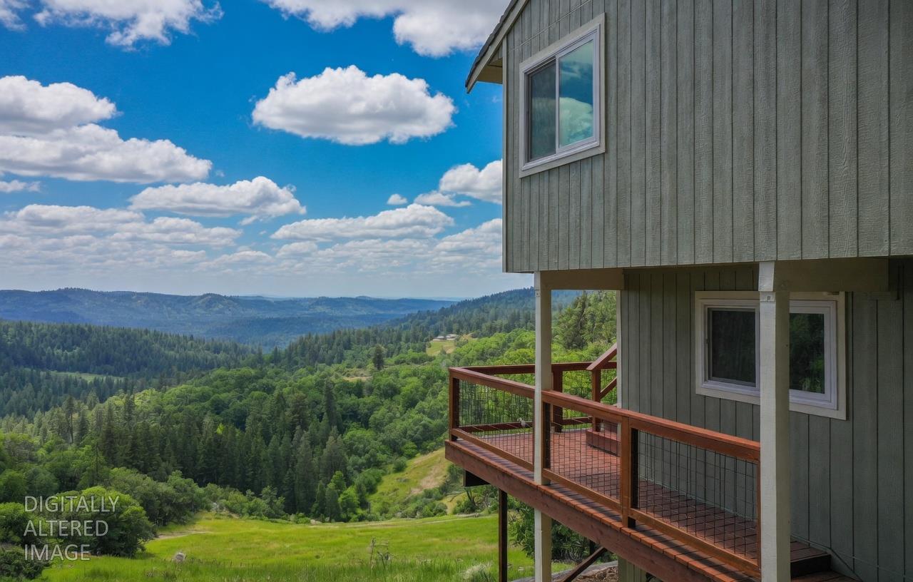 4850 8 Mile Road Camino, CA 95709 - Photo 2 of 30 a balcony with table and chairs