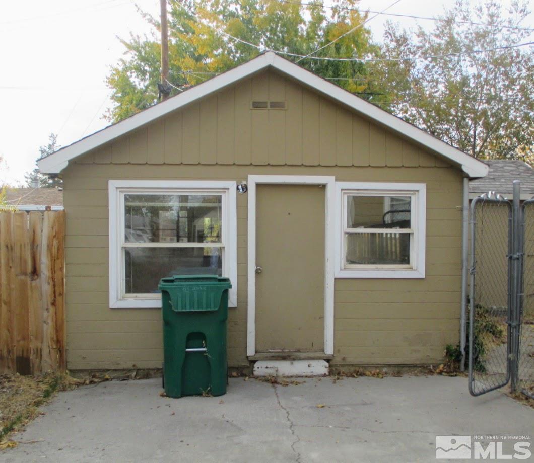 983 Lester Avenue Reno, NV 89502 - Photo 6 of 7 a front view of a house with a garden