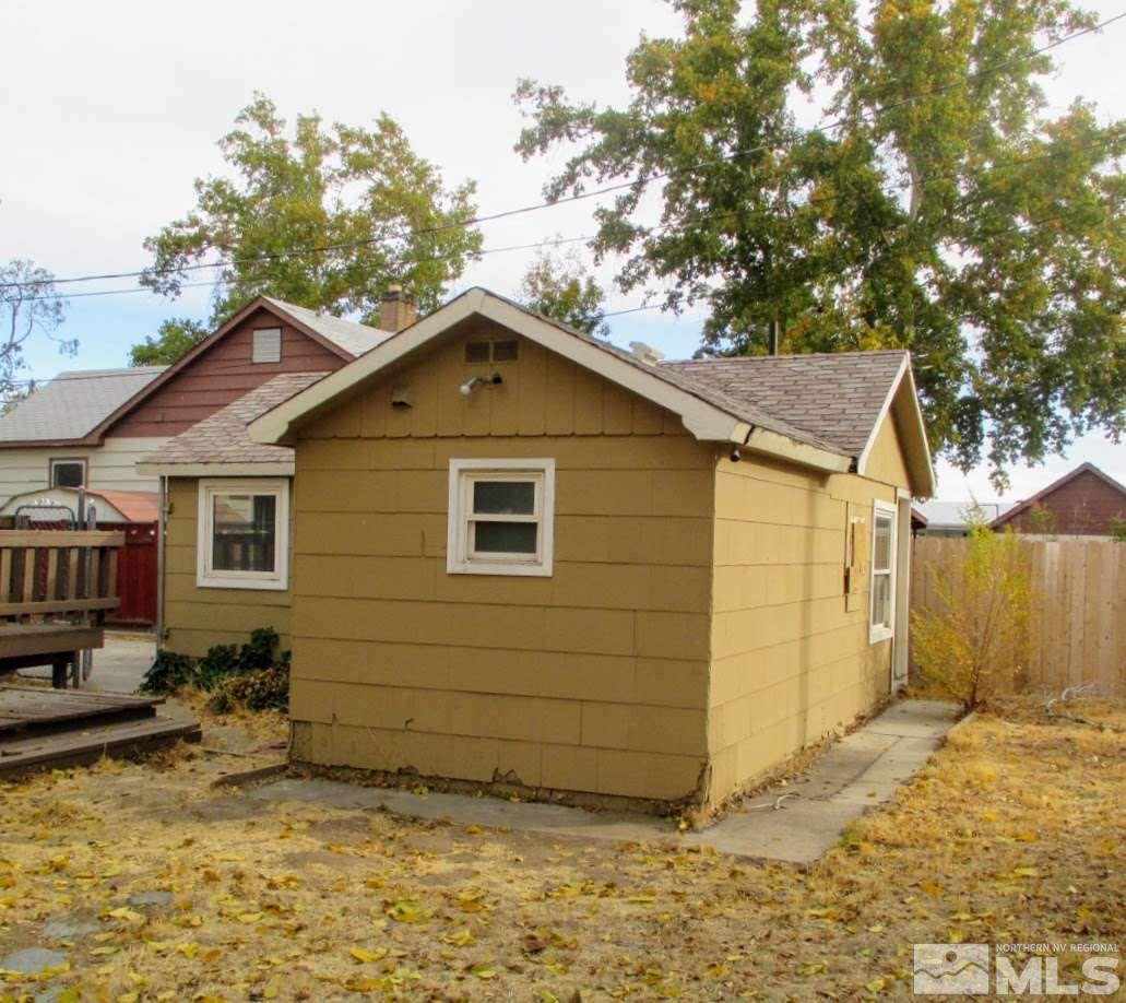 983 Lester Avenue Reno, NV 89502 - Photo 7 of 7 a house with trees in the background