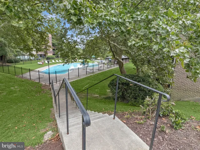 a view of a table and chairs in the patio