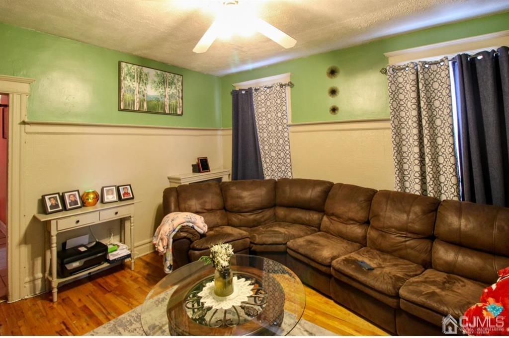3 Ricord Street Newark, NJ 07106 - Photo 16 of 24 a living room with furniture and a window