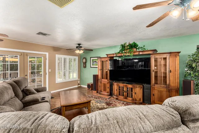 a kitchen with a table and chairs in it
