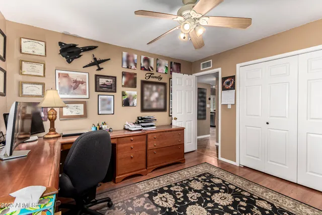 a view of a patio with a table chairs and a patio