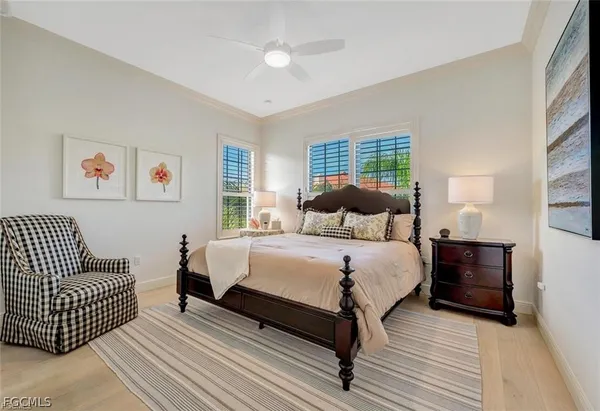 a bedroom with a bed and a walk in closet
