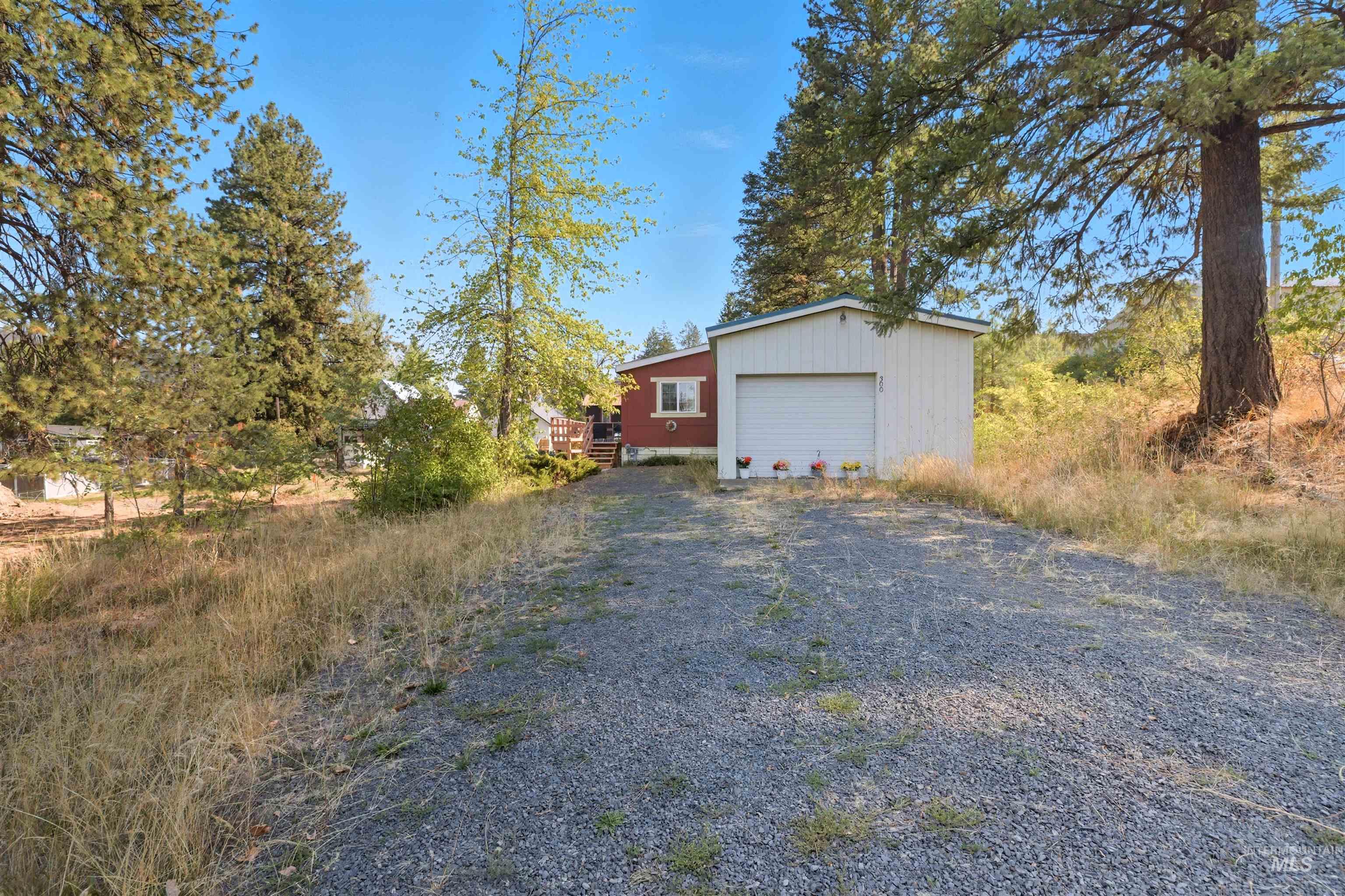 300 Main Street Deary, ID 83823 - Photo 2 of 18 Detached garage featuring driveway