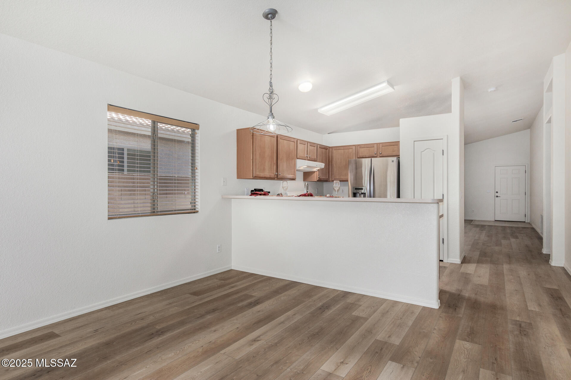 1516 North Old Ranch Road Tucson, AZ 85745 - Photo 8 of 27 a view of kitchen with wooden floor
