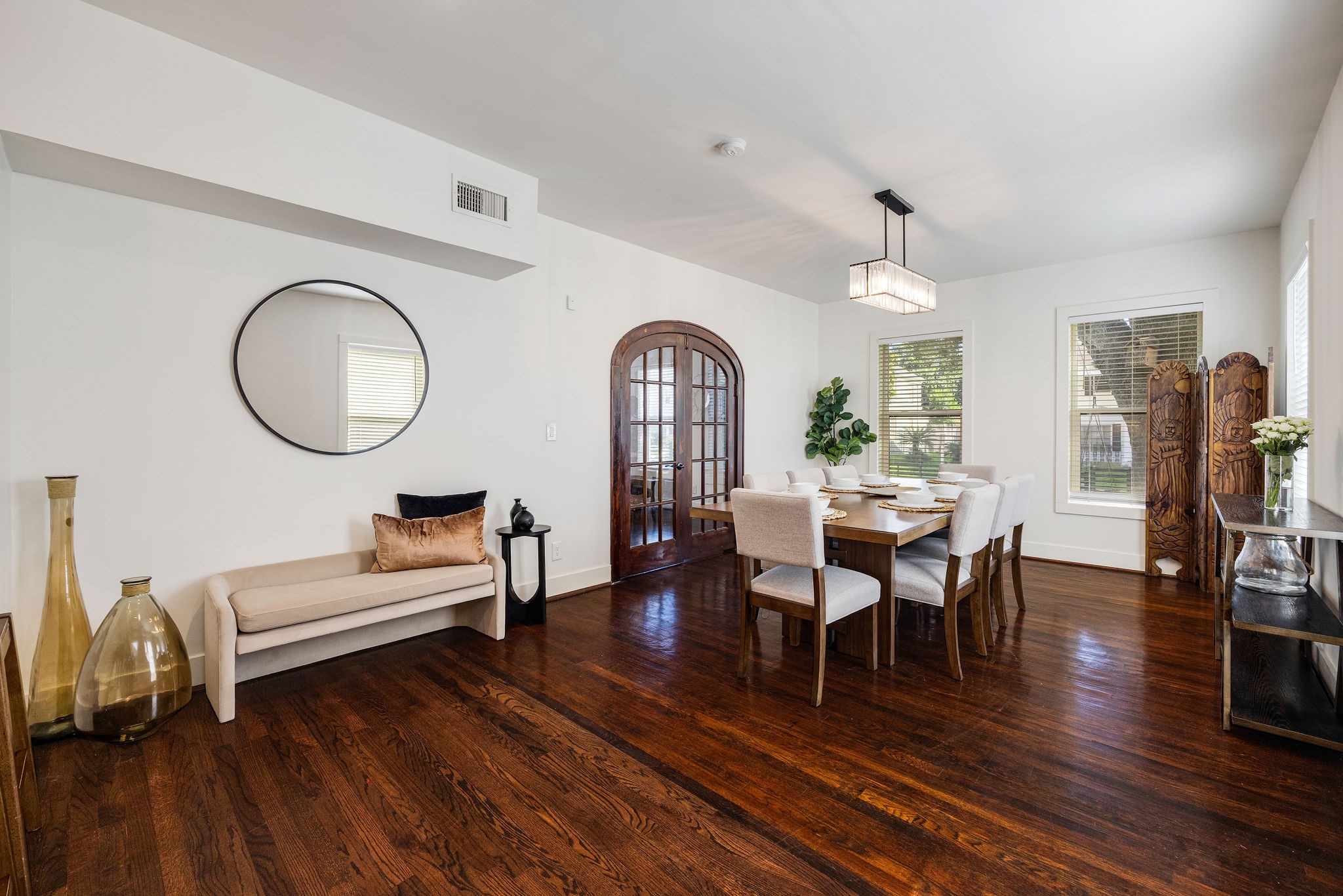 2613 Wichita Street Houston, TX 77004 - Photo 7 of 25 Another view of dining room with warm hardwood floors and seamless access to the kitchen and adjoining spaces.