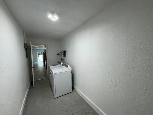 a utility room with a washer and dryer