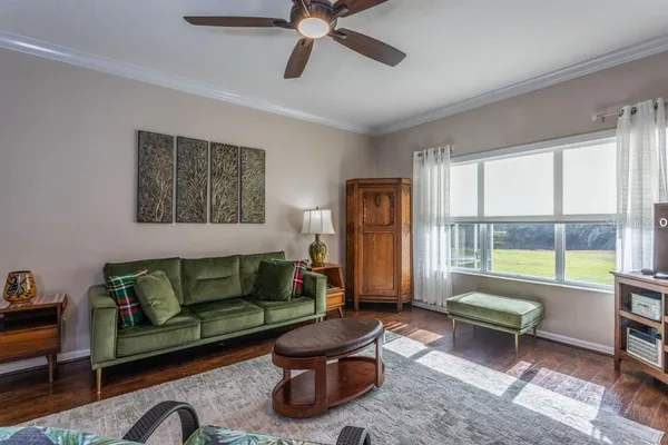 a bedroom with a bed and a television