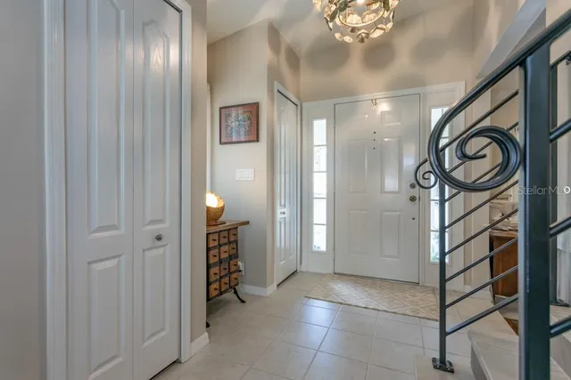 a bedroom that has a bed and a table in it