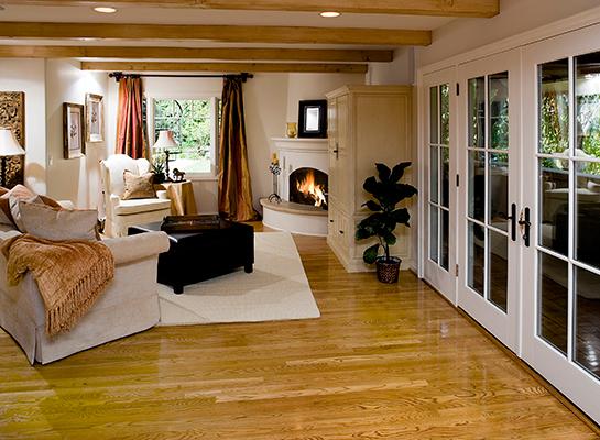 684 Ashley Road Montecito, CA 93108 - Photo 6 of 11 a living room with furniture gym equipment and a fireplace