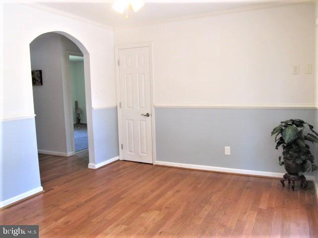 608 Fairmount Road Linthicum, MD 21090 - Photo 10 of 35 DR featuring hardwood floors and chair rail!