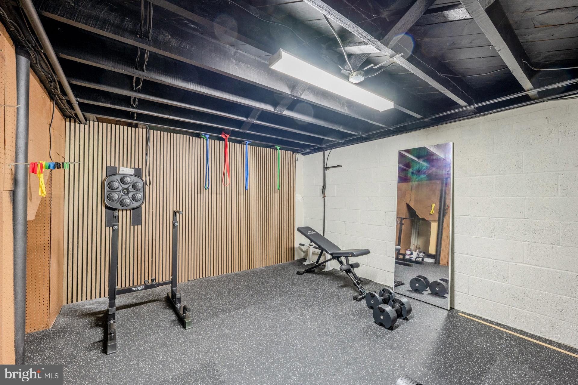 1329 Devils Reach Road Woodbridge, VA 22192 - Photo 25 of 33 a view of a room with gym equipment
