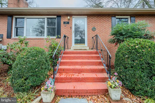 a front view of a house with a porch
