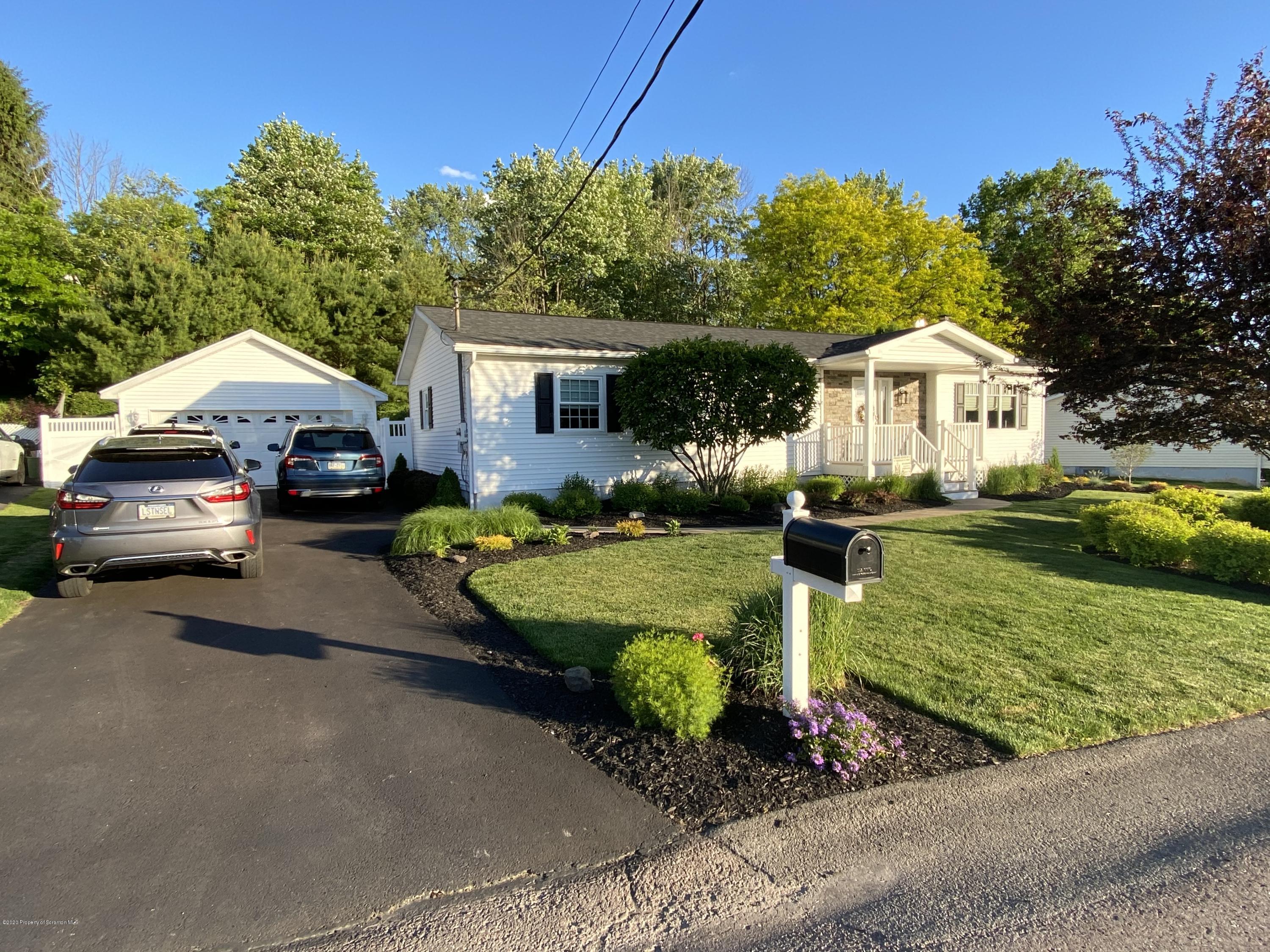 225 Terrace Street Shavertown, PA 18708 - Photo 1 of 19 a front view of a house with garden