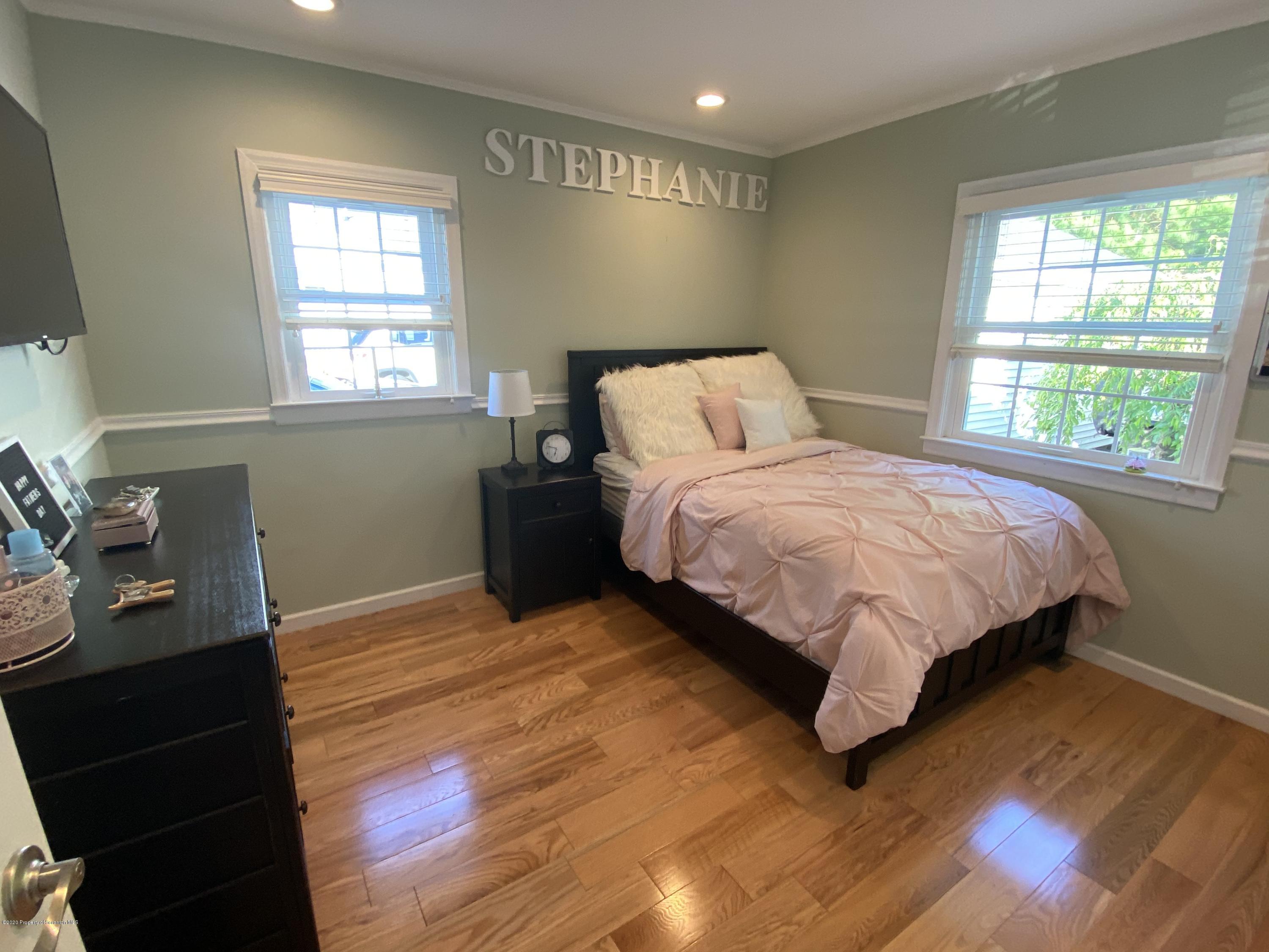 225 Terrace Street Shavertown, PA 18708 - Photo 14 of 19 a bedroom with a bed and a window