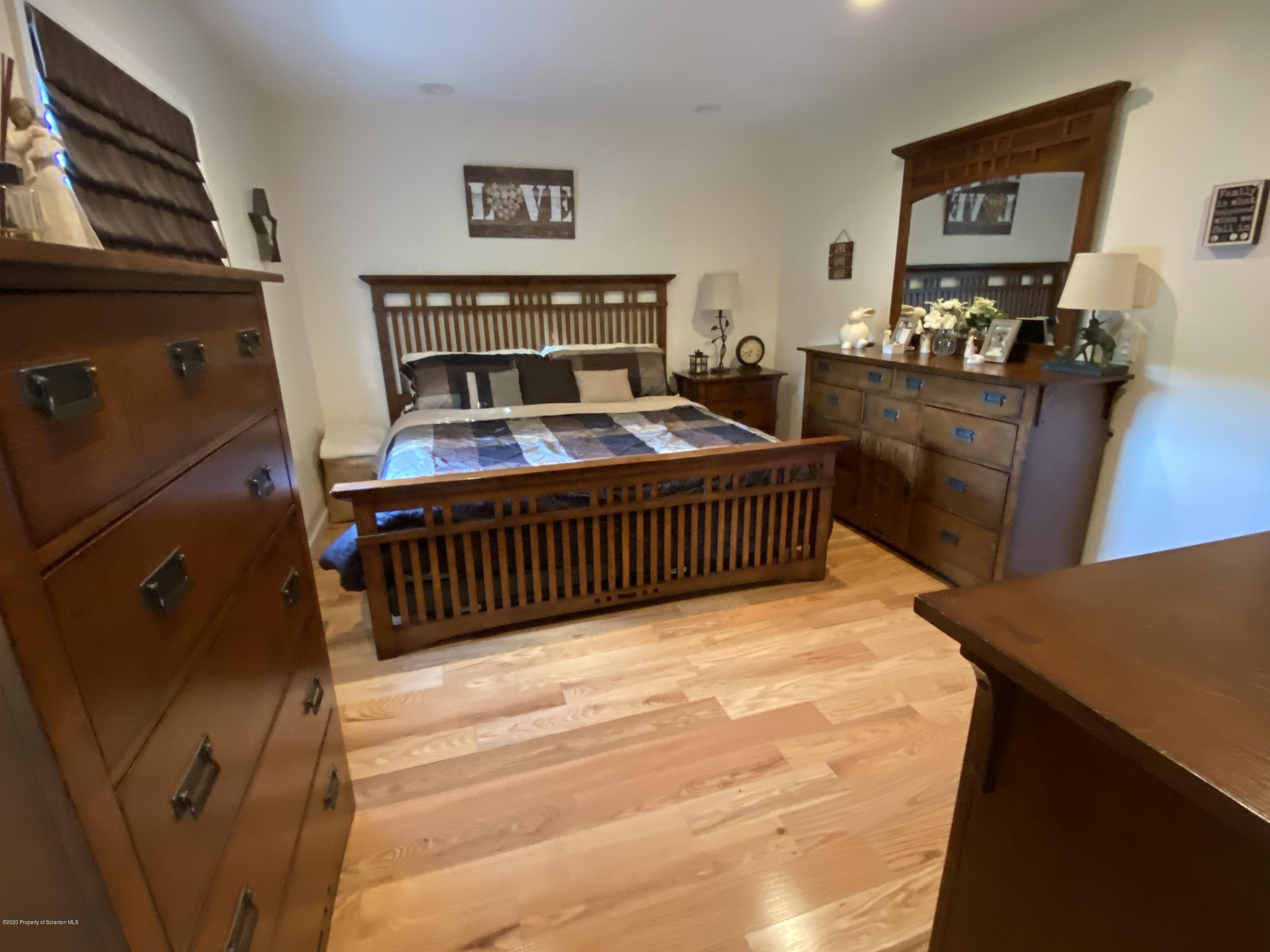 225 Terrace Street Shavertown, PA 18708 - Photo 18 of 19 a bedroom with furniture and wooden floor