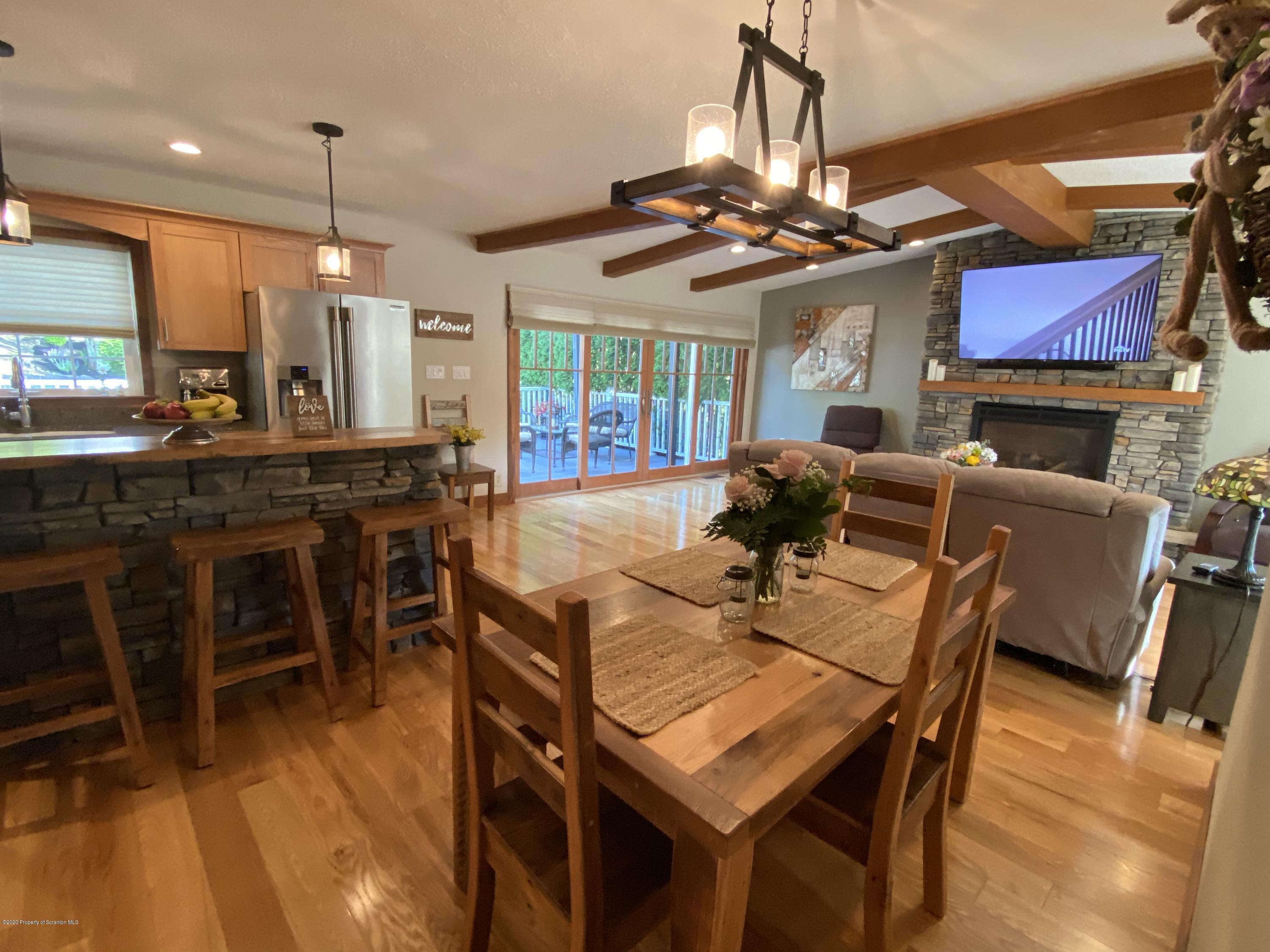 225 Terrace Street Shavertown, PA 18708 - Photo 7 of 19 a view of a dining room with furniture window and wooden floor