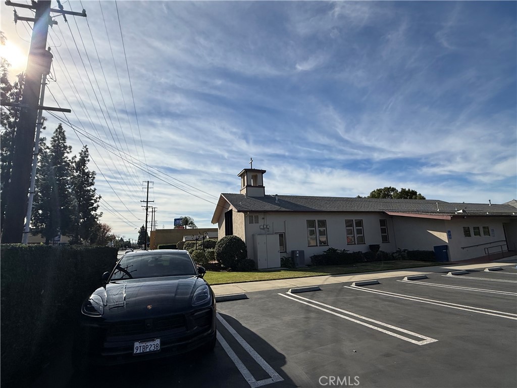 405 South Azusa Avenue Azusa, CA 91702 - Photo 20 of 70 a front view of a house with a garden