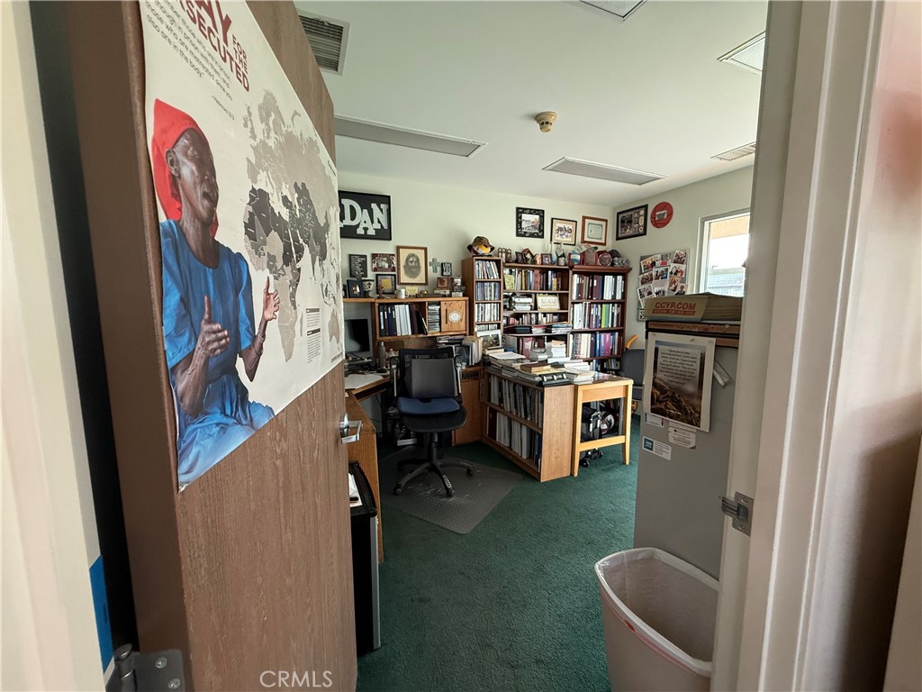 405 South Azusa Avenue Azusa, CA 91702 - Photo 28 of 70 a view of a hallway with workspace and furniture