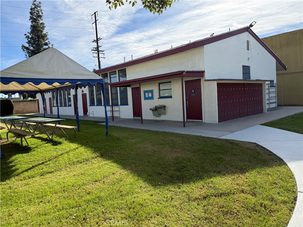 405 South Azusa Avenue Azusa, CA 91702 - Photo 37 of 70 a view of a house with backyard and porch