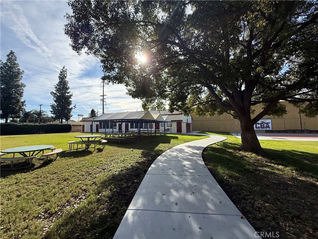 405 South Azusa Avenue Azusa, CA 91702 - Photo 52 of 70 a view of a swimming pool with a garden