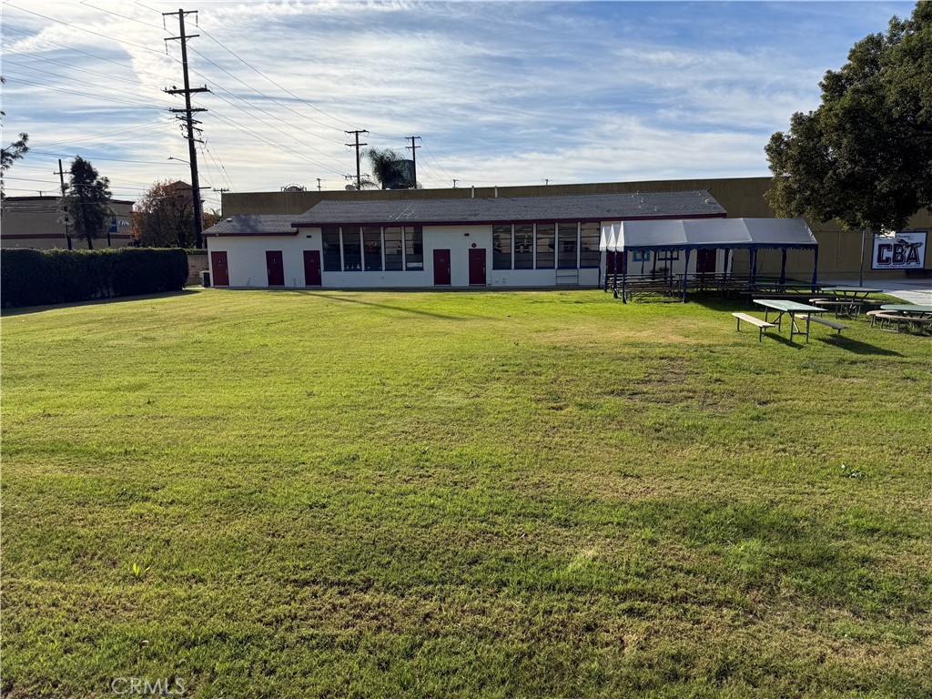 405 South Azusa Avenue Azusa, CA 91702 - Photo 8 of 70 a view of a house with a swimming pool