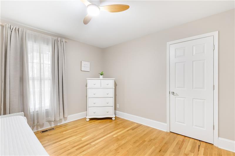 3890 Jim Owens Road Northwest Kennesaw, GA 30152 - Photo 22 of 43 a view of room with cabinet and air conditioner