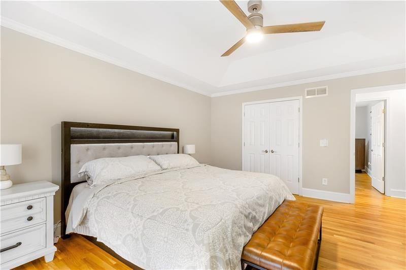 3890 Jim Owens Road Northwest Kennesaw, GA 30152 - Photo 27 of 43 a bedroom with a bed and lamps