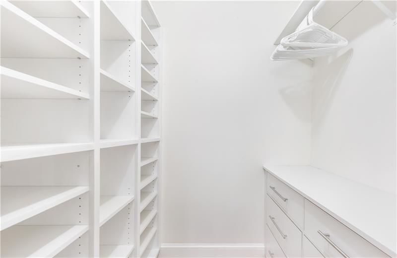 3890 Jim Owens Road Northwest Kennesaw, GA 30152 - Photo 30 of 43 a view of walk in closet with empty racks