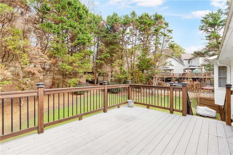 3890 Jim Owens Road Northwest Kennesaw, GA 30152 - Photo 31 of 43 a view of a balcony with wooden floor