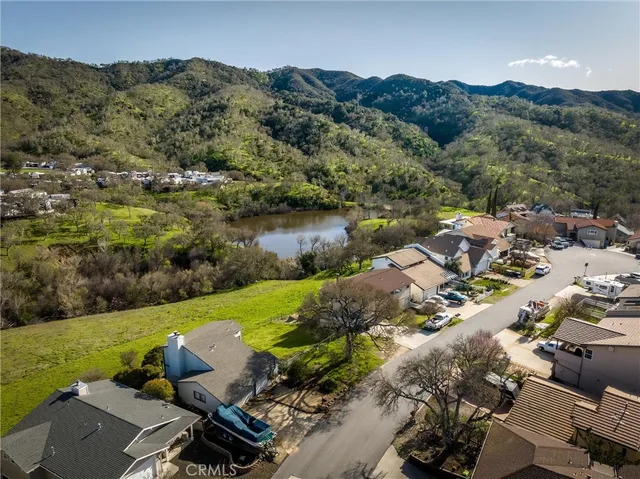 an aerial view of a house with a garden