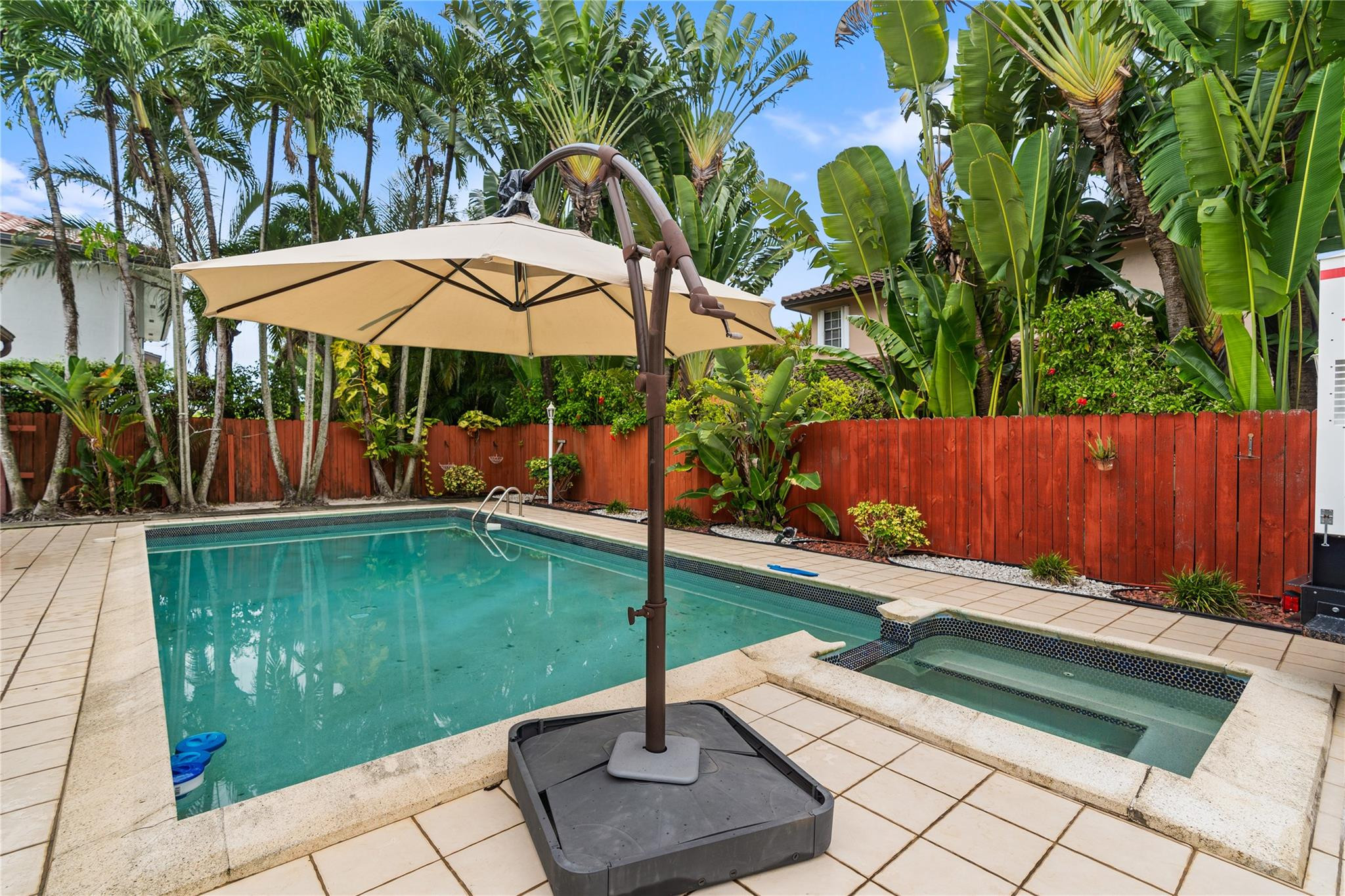 7440 Southwest 93rd Avenue Miami, FL 33173 - Photo 12 of 50 a view of a backyard with sitting area