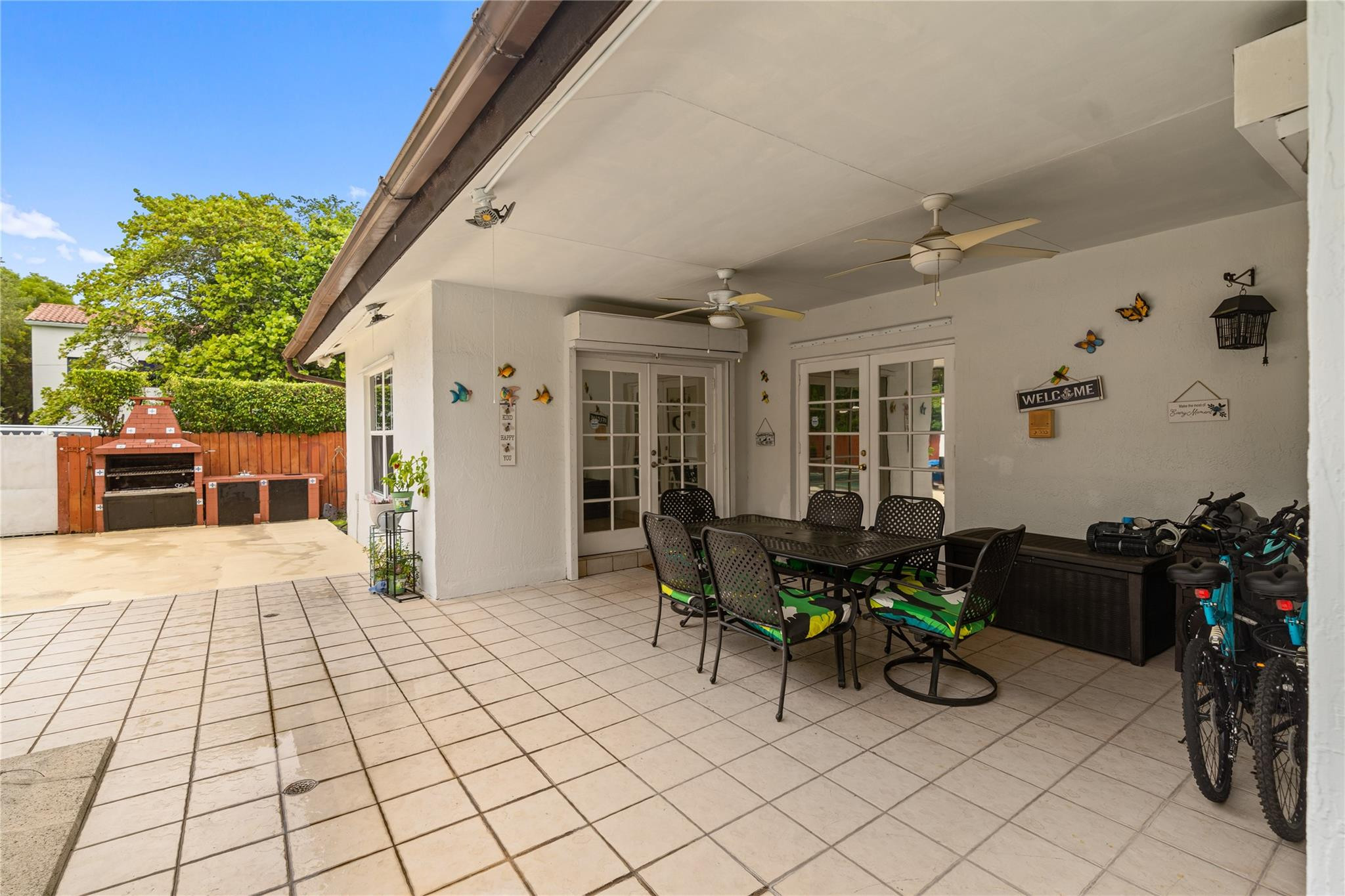 7440 Southwest 93rd Avenue Miami, FL 33173 - Photo 17 of 50 a view of a patio with table and chairs