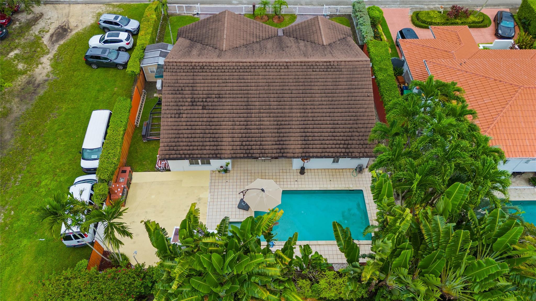 7440 Southwest 93rd Avenue Miami, FL 33173 - Photo 2 of 50 with aerial view of a house with a yard