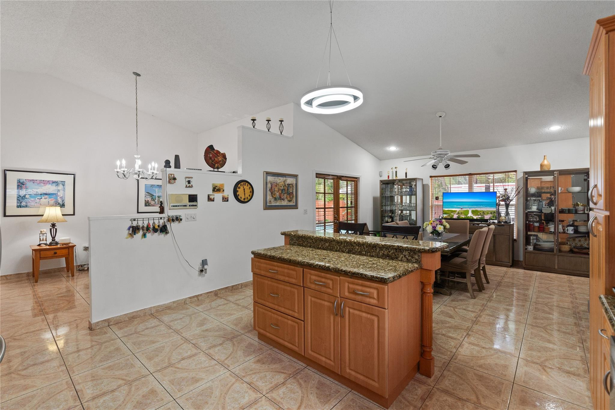 7440 Southwest 93rd Avenue Miami, FL 33173 - Photo 22 of 50 a kitchen with stainless steel appliances granite countertop a sink and a refrigerator