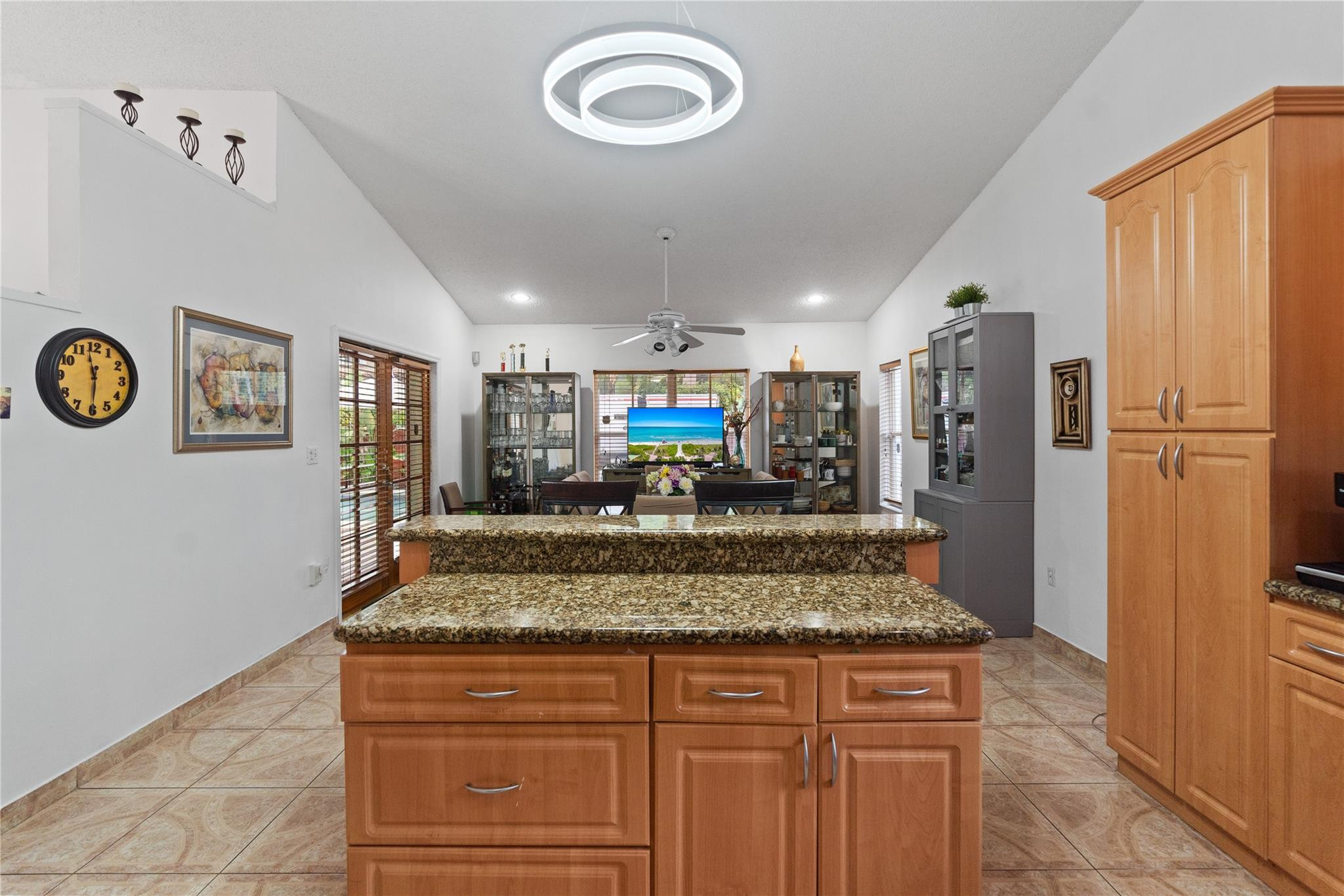 7440 Southwest 93rd Avenue Miami, FL 33173 - Photo 26 of 50 a view of a kitchen with a refrigerator and a stove top oven