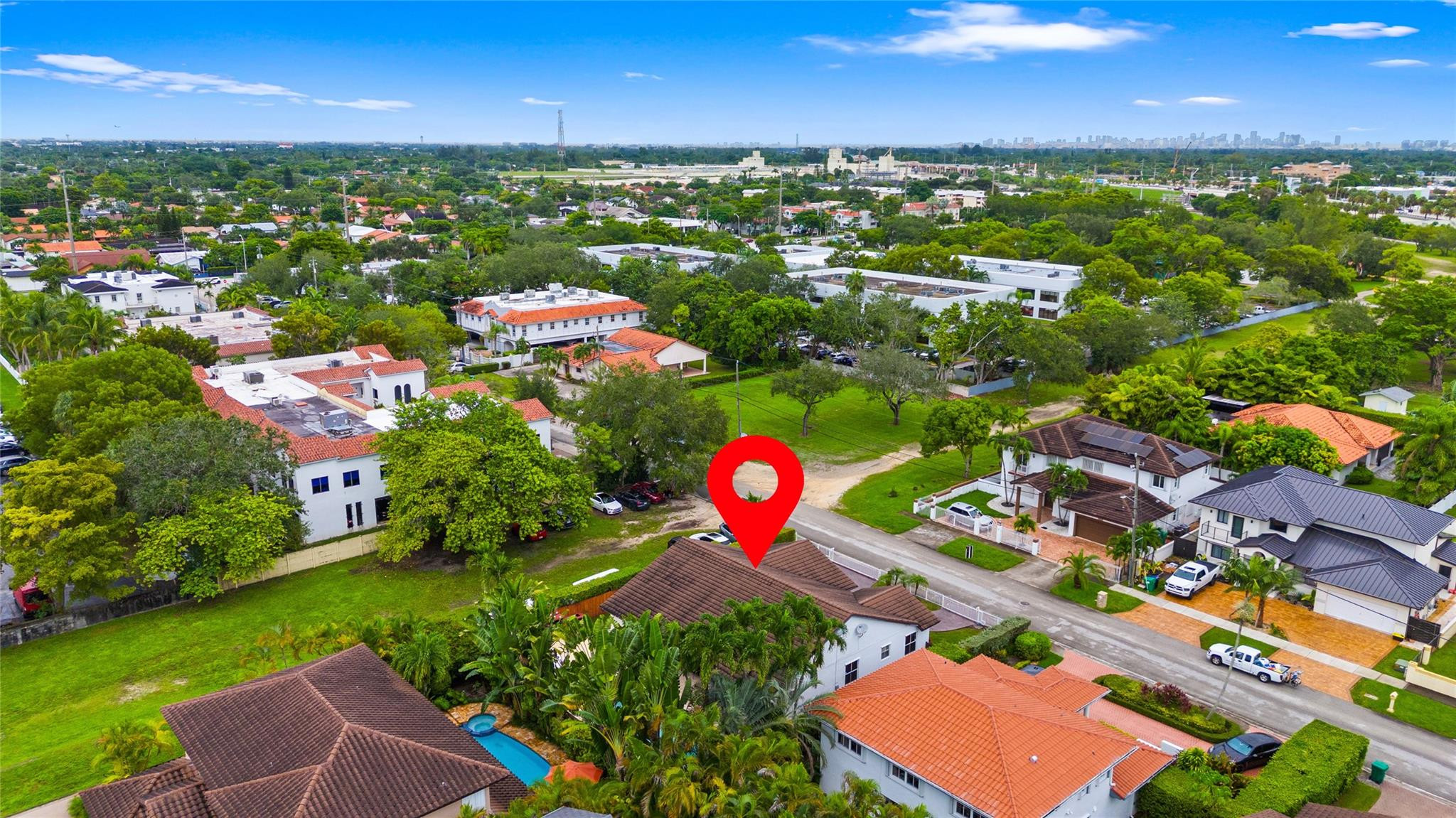 7440 Southwest 93rd Avenue Miami, FL 33173 - Photo 3 of 50 an aerial view of residential houses with outdoor space and trees