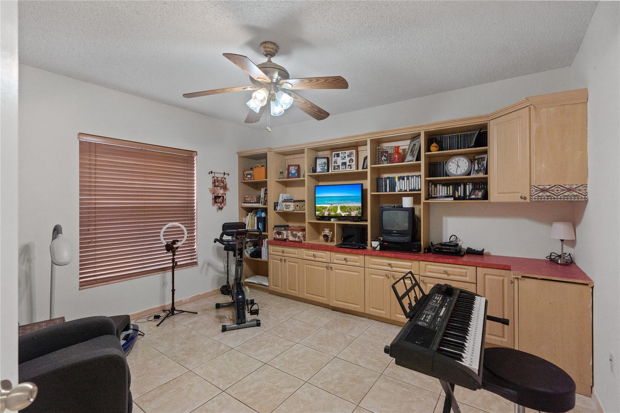 7440 Southwest 93rd Avenue Miami, FL 33173 - Photo 40 of 50 a view of a workspace with furniture and toys
