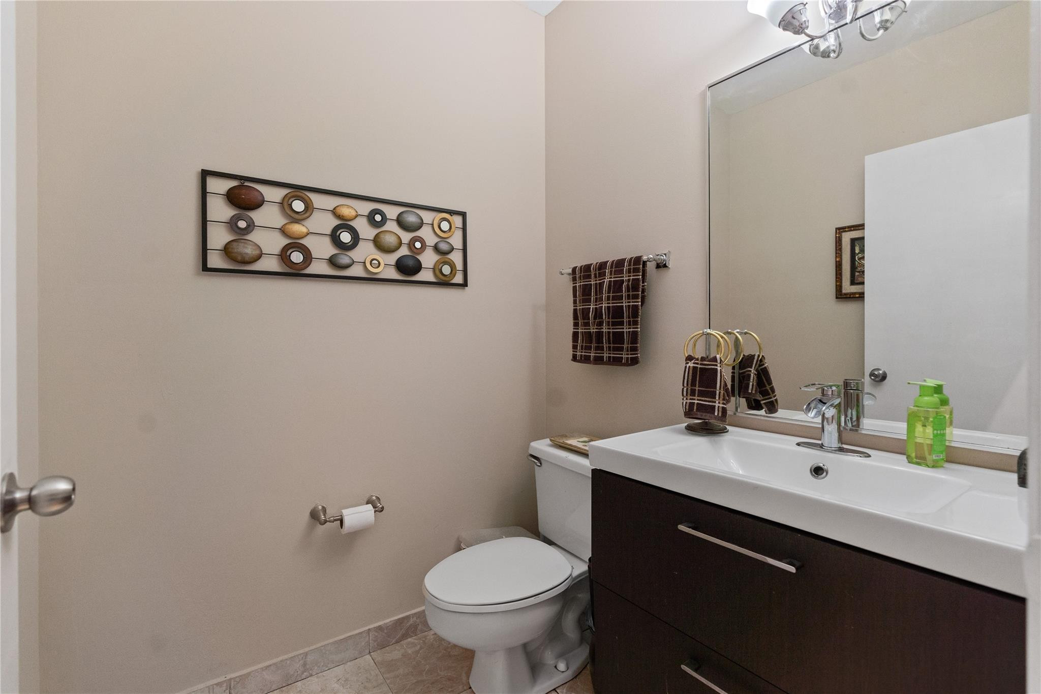 7440 Southwest 93rd Avenue Miami, FL 33173 - Photo 41 of 50 a bathroom with a toilet sink and mirror