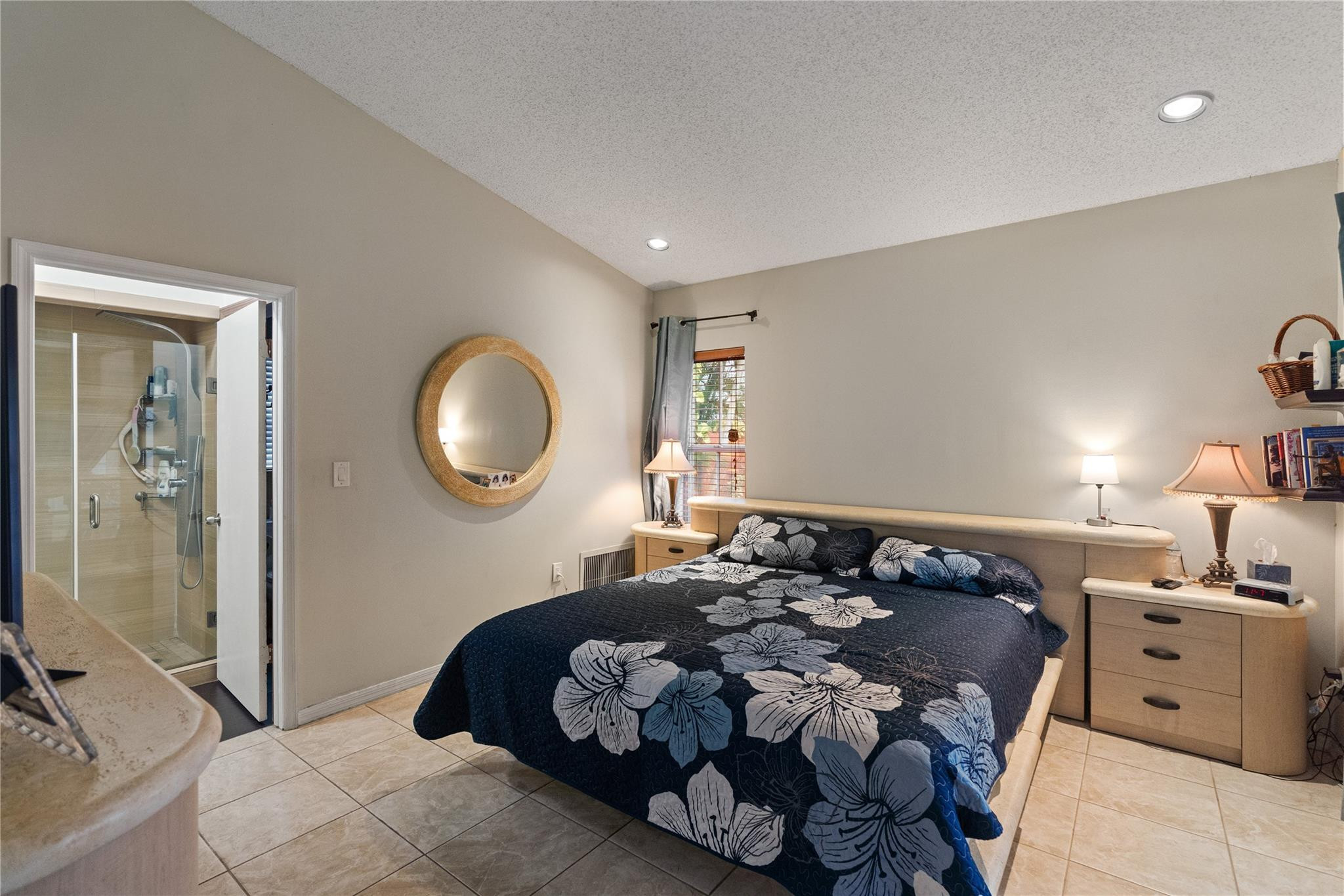 7440 Southwest 93rd Avenue Miami, FL 33173 - Photo 42 of 50 a bedroom with a bed and a mirror