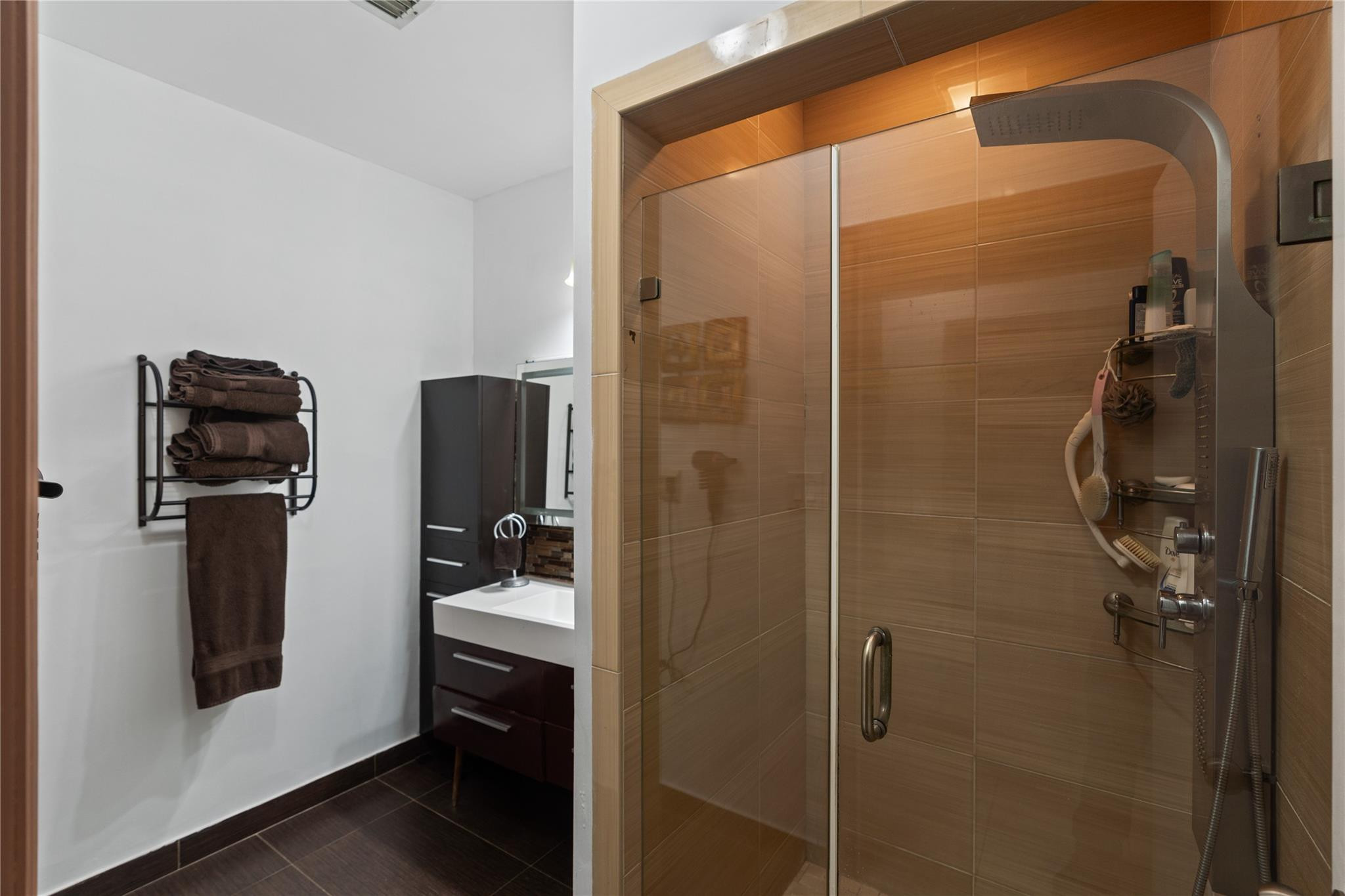 7440 Southwest 93rd Avenue Miami, FL 33173 - Photo 46 of 50 a bathroom with a shower and mirror