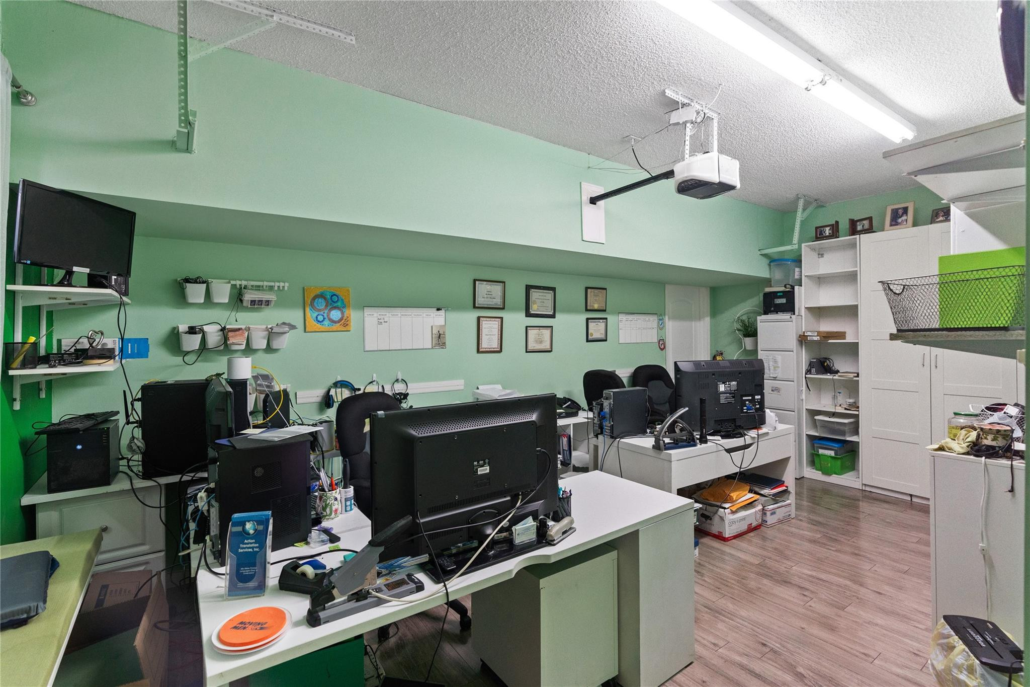 7440 Southwest 93rd Avenue Miami, FL 33173 - Photo 49 of 50 a room with gym equipment and wooden floor