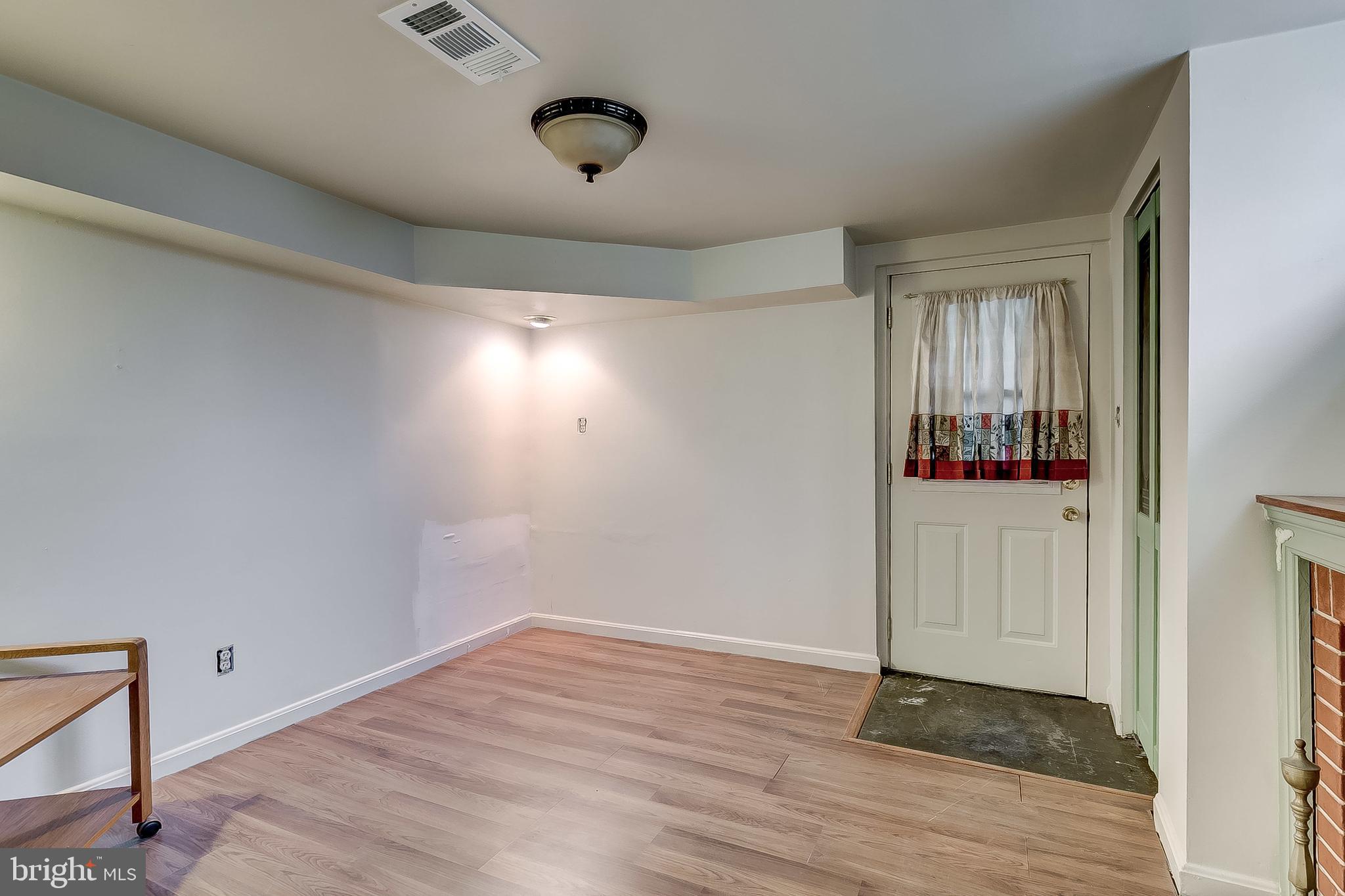 502 West Joppa Road Baltimore, MD 21204 - Photo 24 of 49 Finished basement area w/ fireplace
