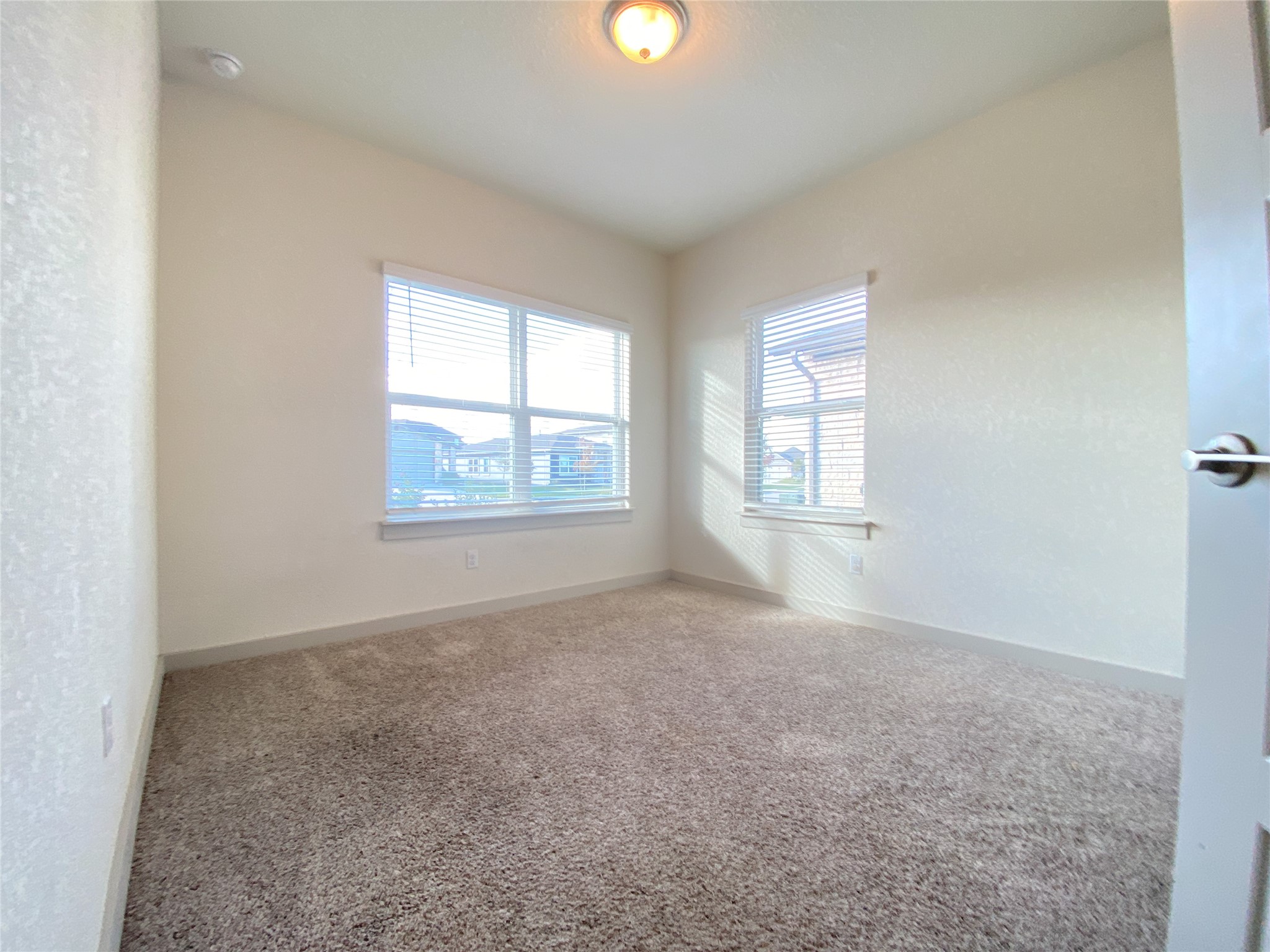 5121 Vanner Path Georgetown, TX 78626 - Photo 17 of 24 an empty room with windows and closet