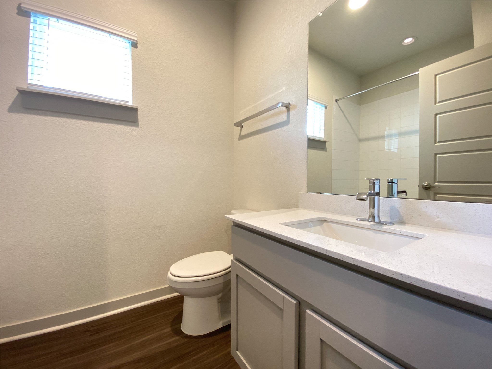 5121 Vanner Path Georgetown, TX 78626 - Photo 21 of 24 a bathroom with a granite countertop sink toilet and a mirror